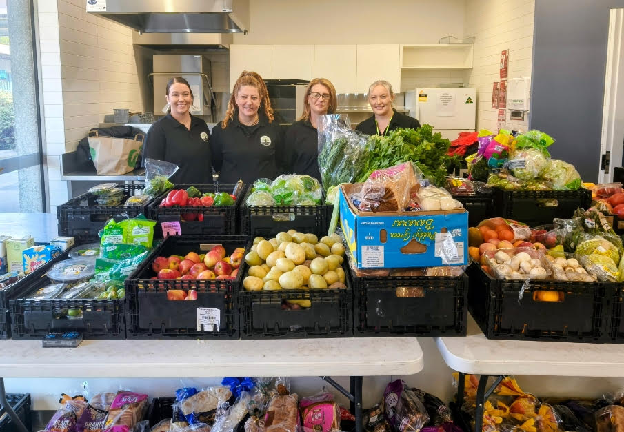 Willow House Community Support Ltd volunteers at the Moe Community Foodbank with fresh fruit, vegetables and food relief supplies in Gippsland, Victoria.